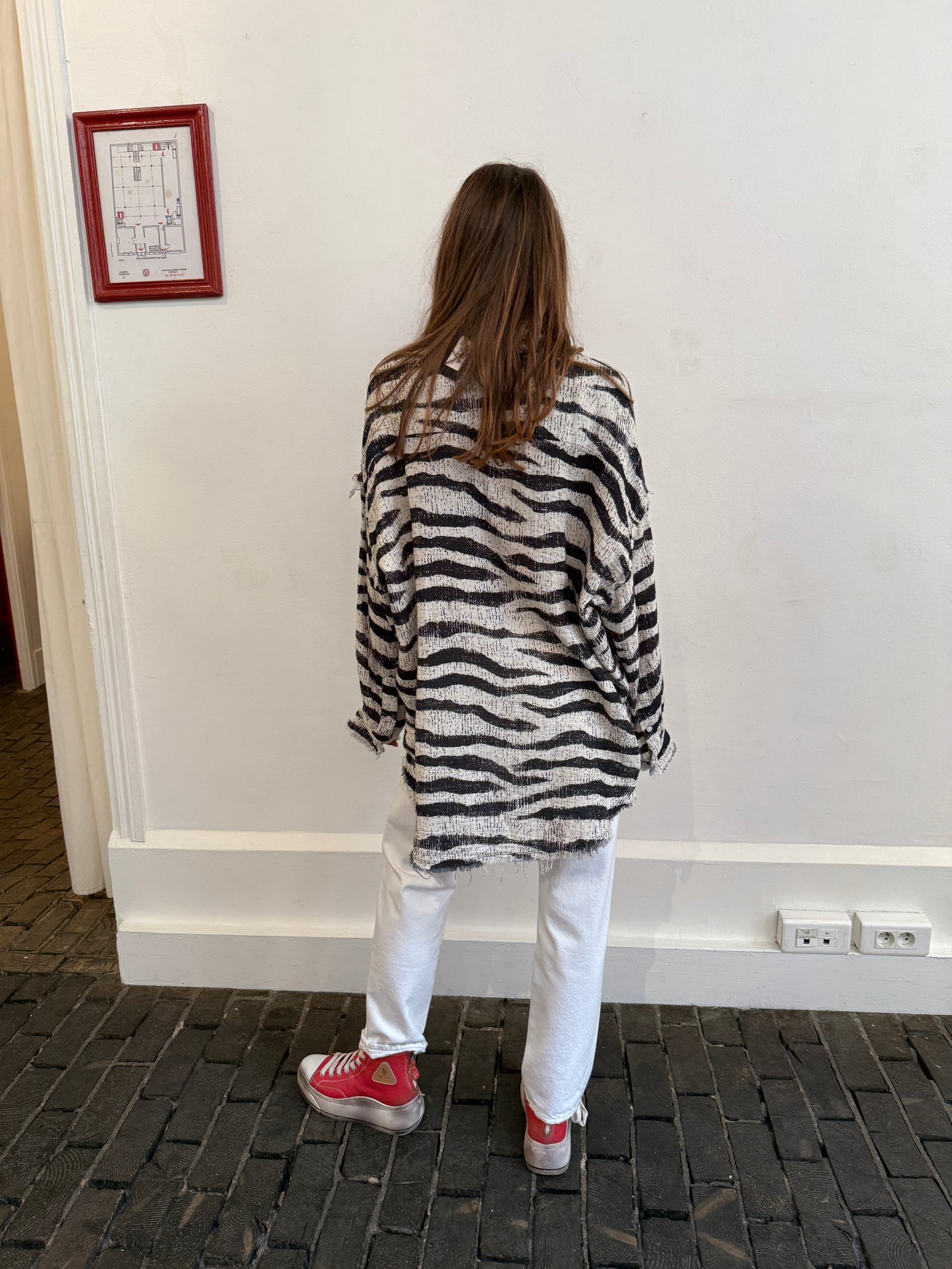 Shredded seam drop neck shirt