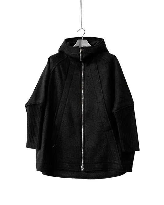 Wool jacket with high collar and knitted yak sleeves