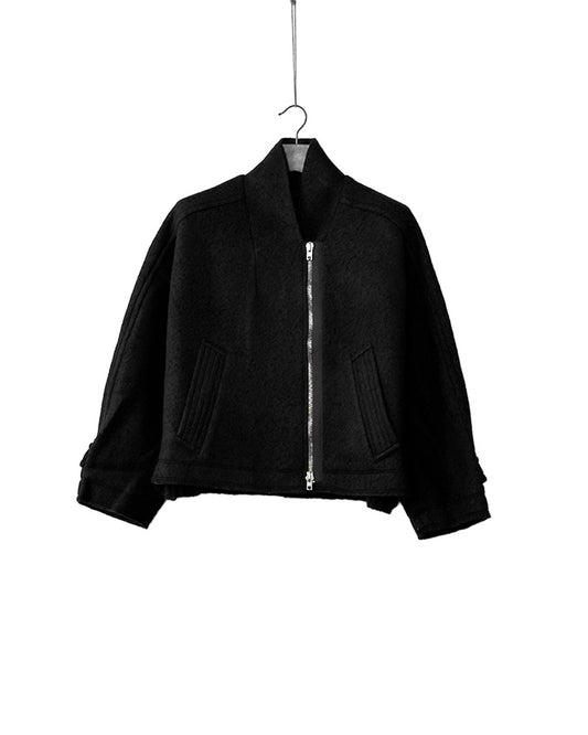 Short wool trench coat with knitted yak arms