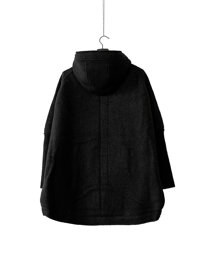Wool jacket with high collar and knitted yak sleeves