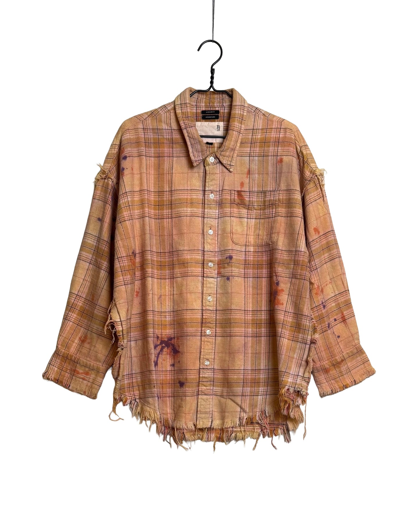 Shredded seam drop neck shirt